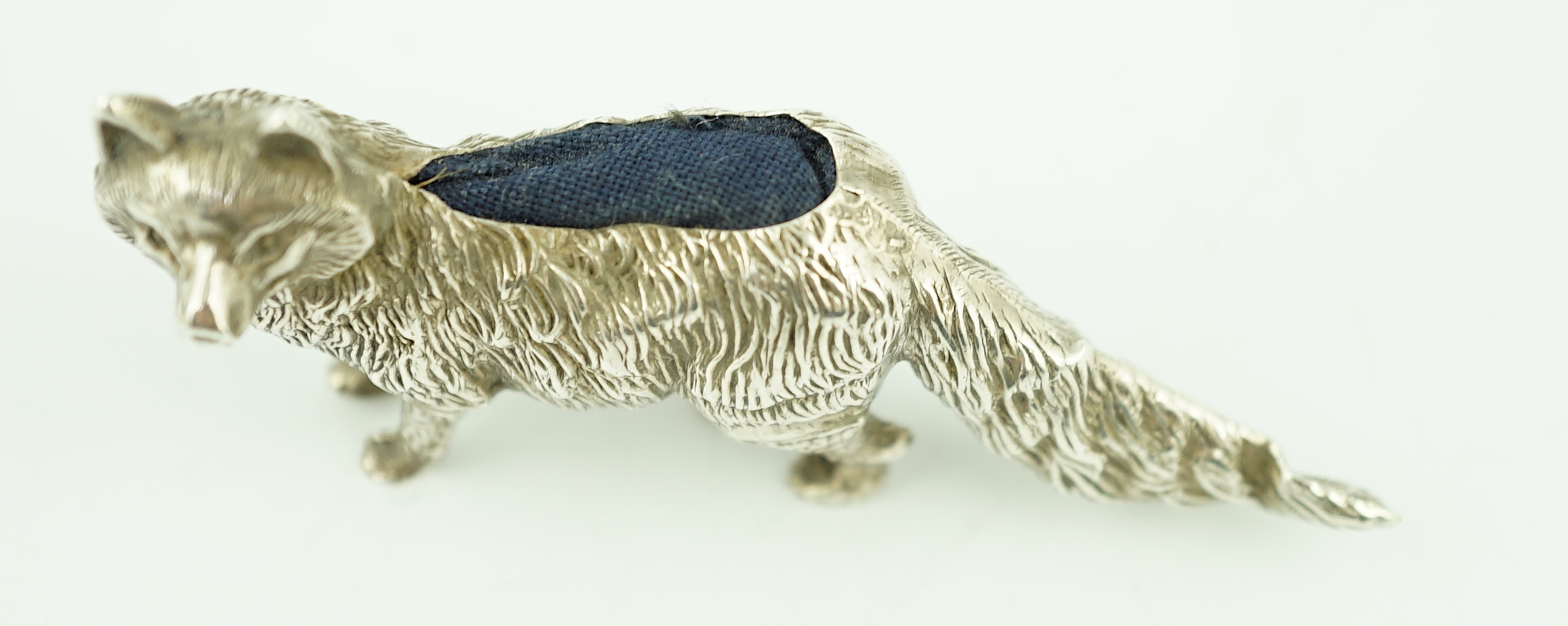 An Edwardian novelty silver pin cushion, modelled as a fox, Levi & Salaman